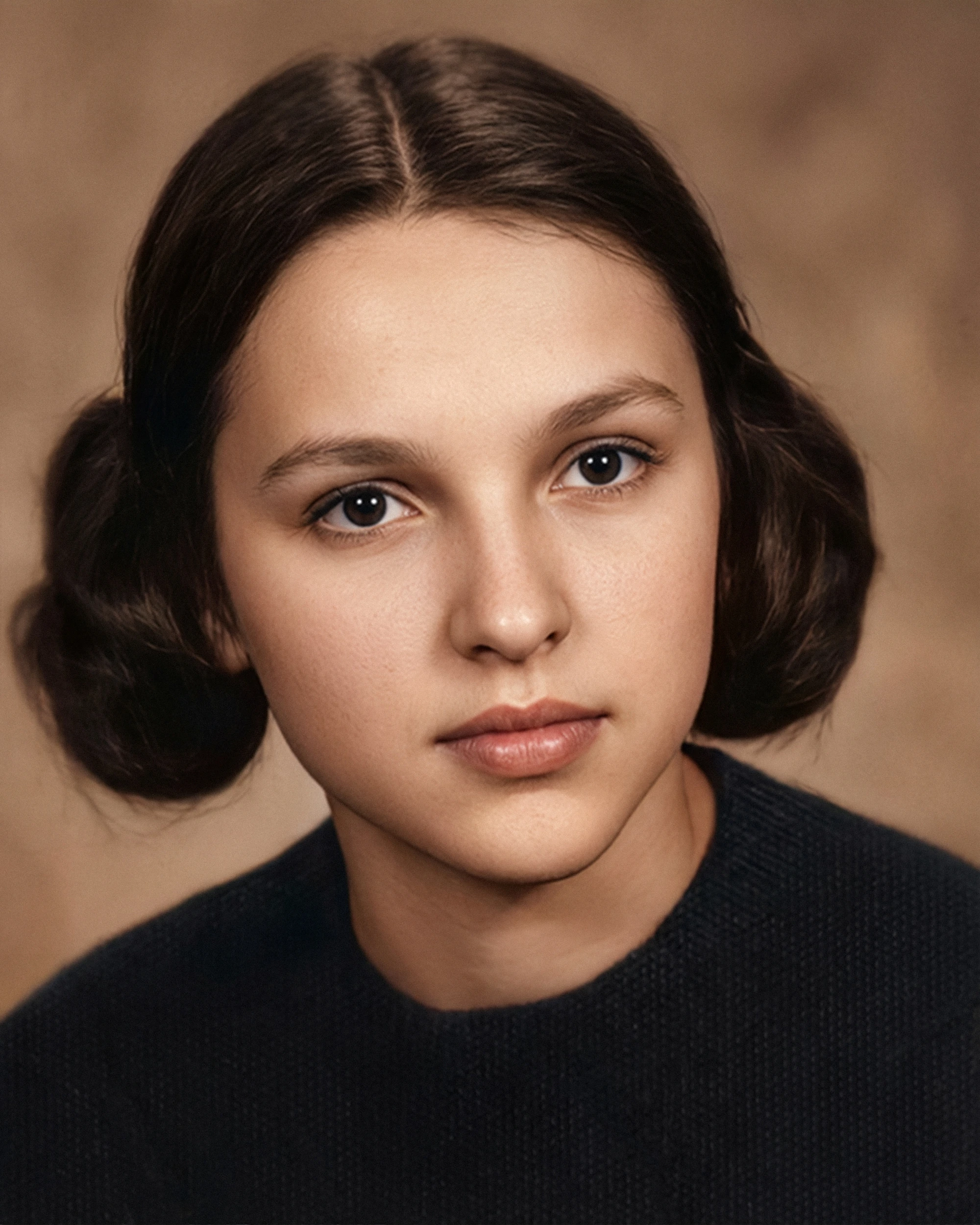 Restored portrait of a young woman with crack damage repaired