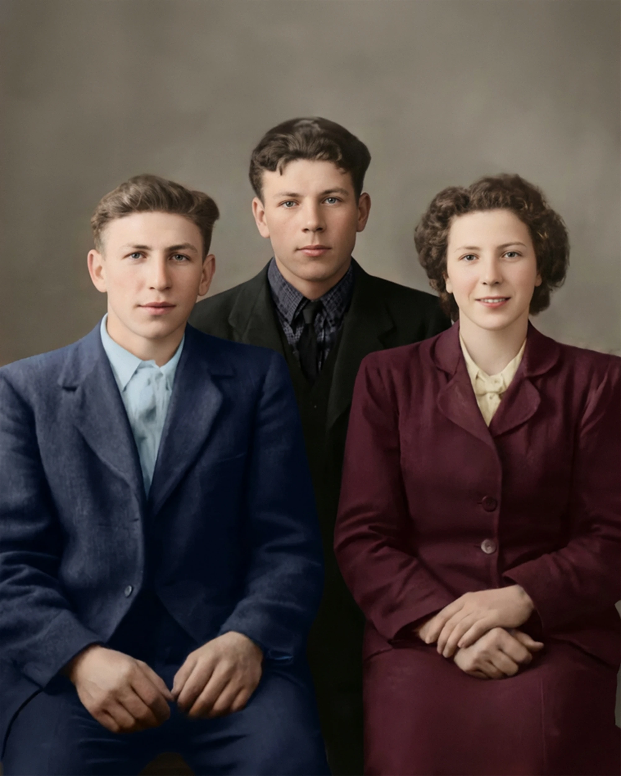 Restored vintage group portrait with damage removed